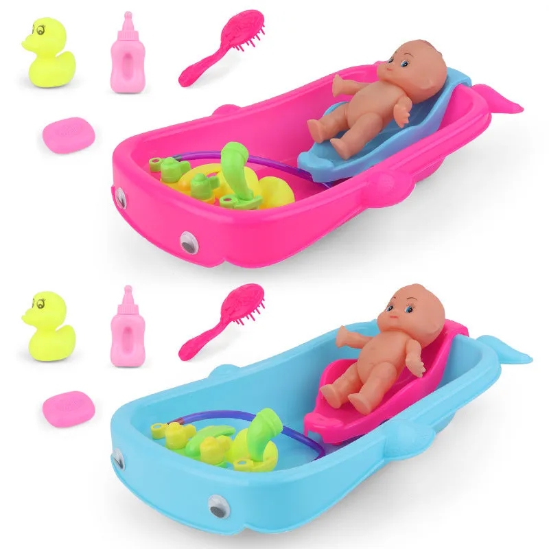 Baby Playing In Water Tub With Bath Toys