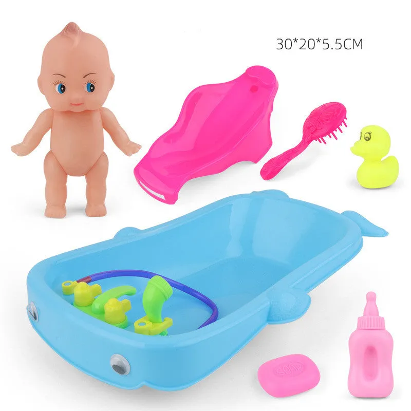 Baby Playing In Water Tub With Bath Toys