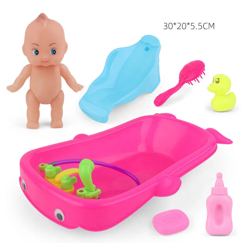 Baby Playing In Water Tub With Bath Toys